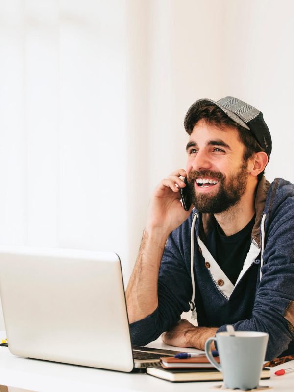 portrait-of-man-telephoning-with-smartphone-at-mod-2022-12-16-22-42-43-utc.jpg